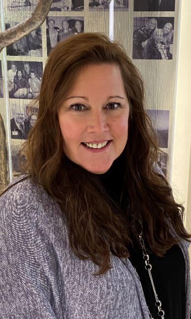 Woman with long hair smiling